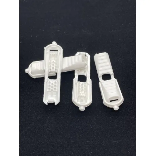 Plastová koncovka zamačkávací bílá